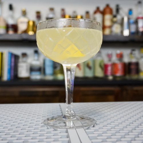 a French 75 with citrus juice and sugar syrup with floral notes and delicate flavors