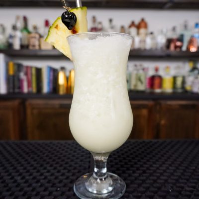 piña colada over ice in a chilled glass-2