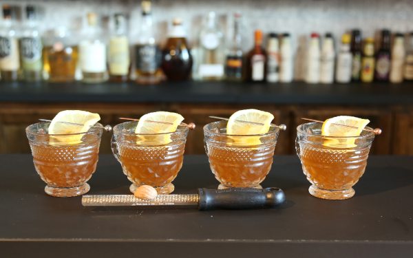 bowl of punch in larger batches, served as a tasty drink in a rum punch bowl