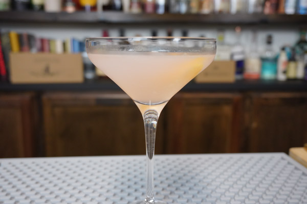 Cosmopolitan cocktail in a chilled coupe glass