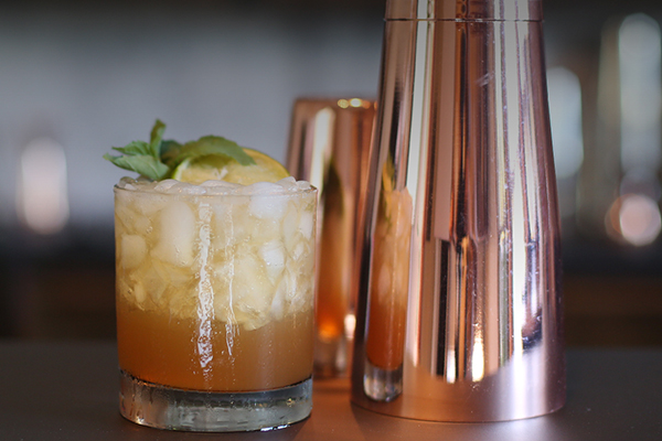 Mai Tai with citrus flavors, lime wheel, and sprig of mint