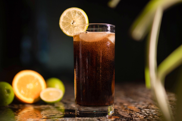 easy drinking cocktail the color of tea from 1 fluid ounce Cola by elissa landry via unsplash