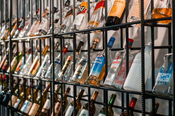 different types of liquor in a shop Photo via unsplash