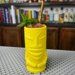 2 ounce dark rum in a tall glass for a popular cocktail called the Zombie