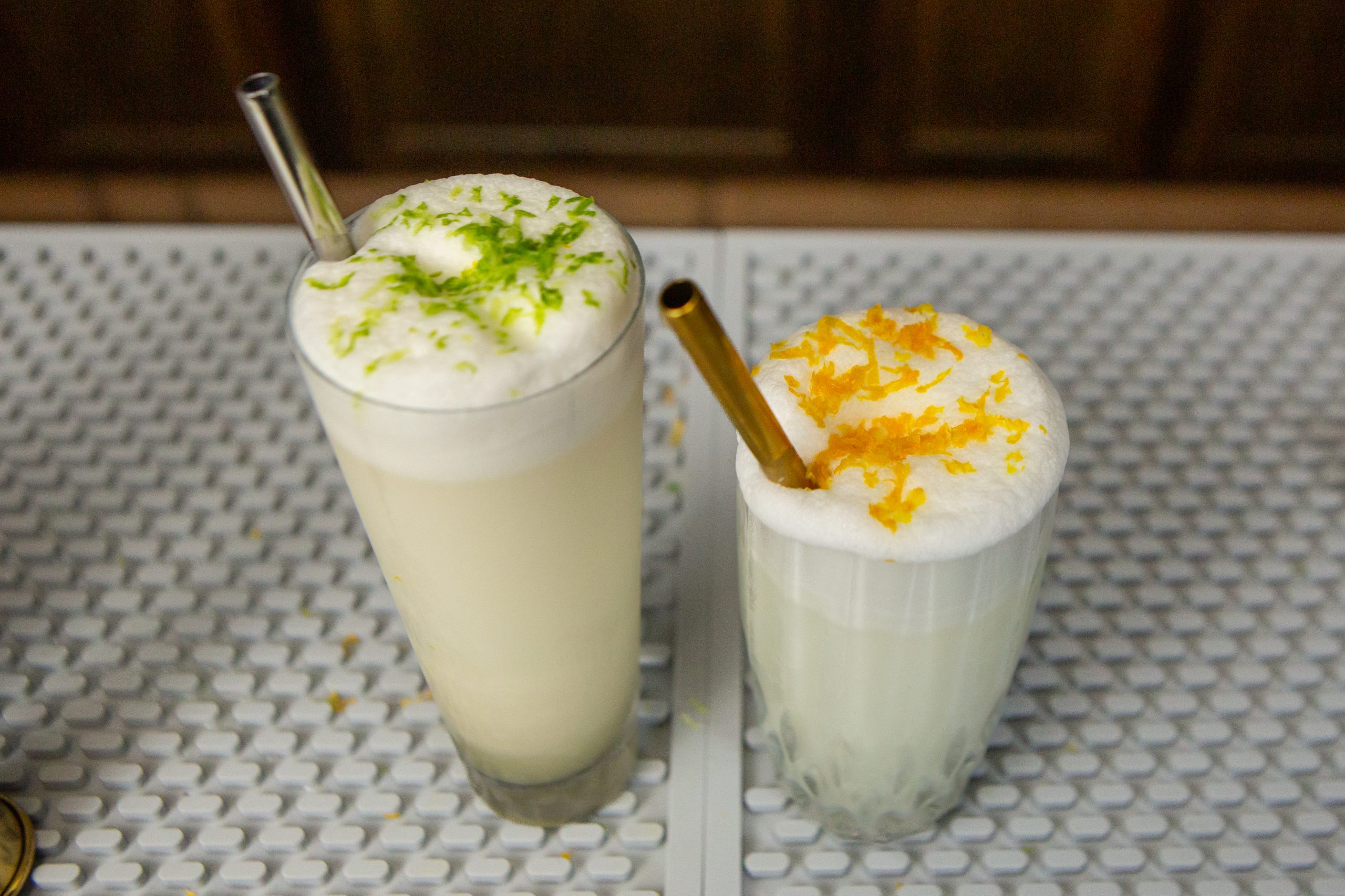 Classic Ramos Gin Fizz next to a variation